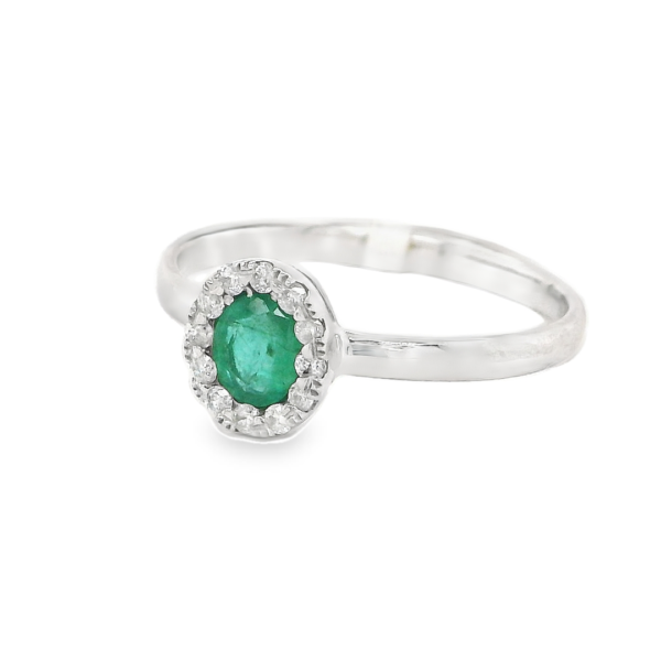 Oval Diamond and Emerald Ring